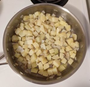 Potatoes and onions in a pan